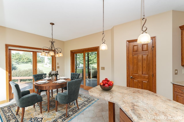 1608 Greystone Ln SW, Rochester, MN 55902 - dining room featuring a chandelier
