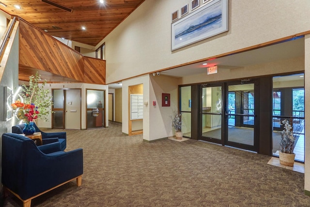 2485 Canabury Dr Unit 116, Little Canada, MN 55117 - community lobby featuring a towering ceiling, wood ceiling, and recessed lighting