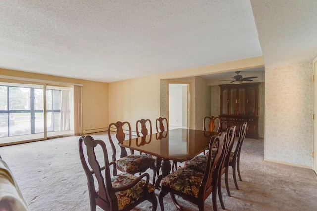 2485 Canabury Dr Unit 116, Little Canada, MN 55117 - dining area featuring light colored carpet, a textured ceiling, and a ceiling fan