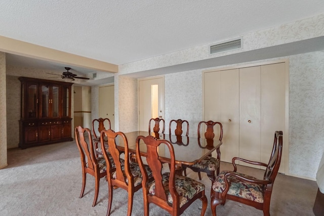 2485 Canabury Dr Unit 116, Little Canada, MN 55117 - dining space with wallpapered walls, light colored carpet, a textured ceiling, and ceiling fan