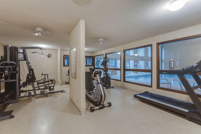 2485 Canabury Dr Unit 116, Little Canada, MN 55117 - workout area with a textured ceiling