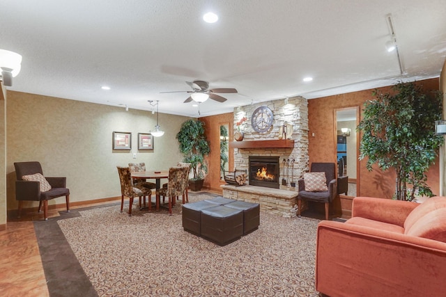 2485 Canabury Dr Unit 116, Little Canada, MN 55117 - living area featuring ceiling fan, a fireplace, recessed lighting, and rail lighting