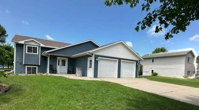 1103 15th St, Montevideo, MN 56265 - split level home featuring an attached garage, a front yard, and driveway