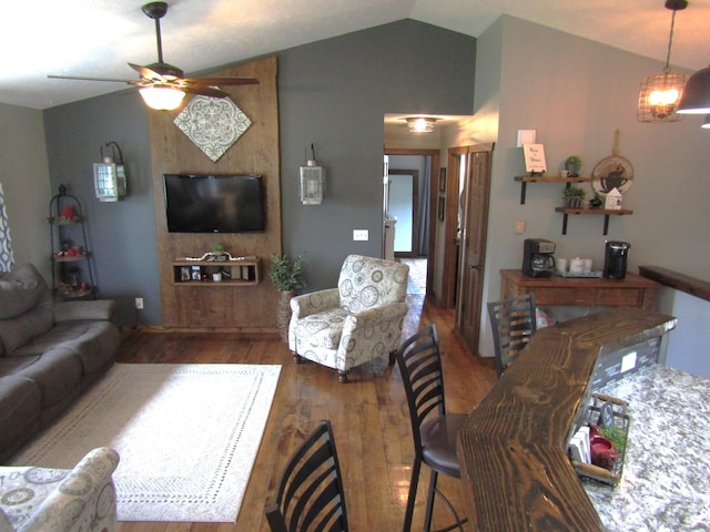 1103 15th St, Montevideo, MN 56265 - living area featuring lofted ceiling, ceiling fan, and wood finished floors