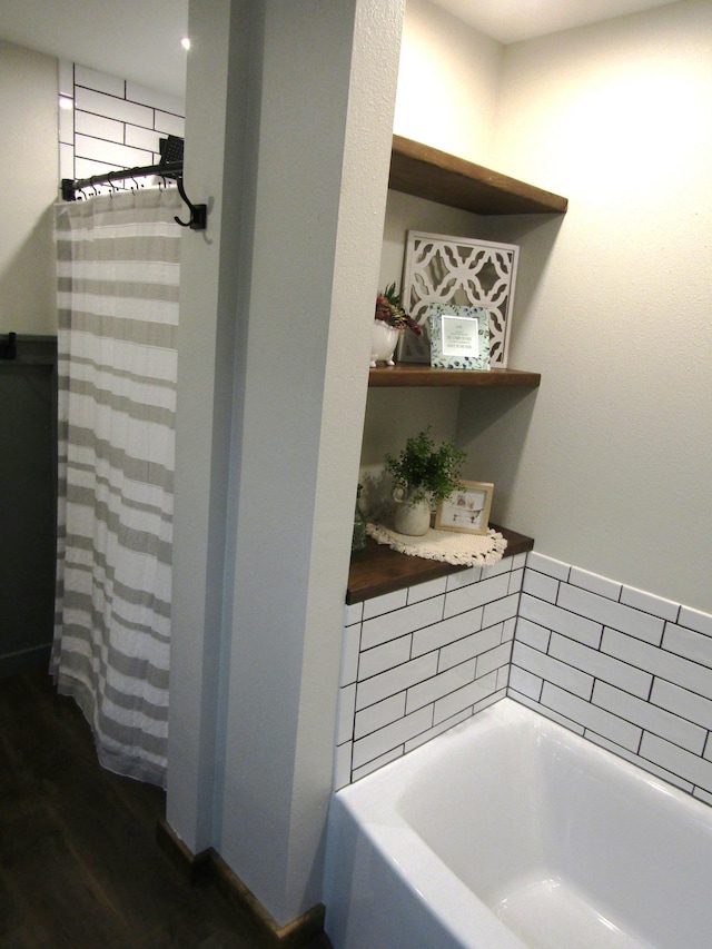 1103 15th St, Montevideo, MN 56265 - full bath with a garden tub and wood finished floors