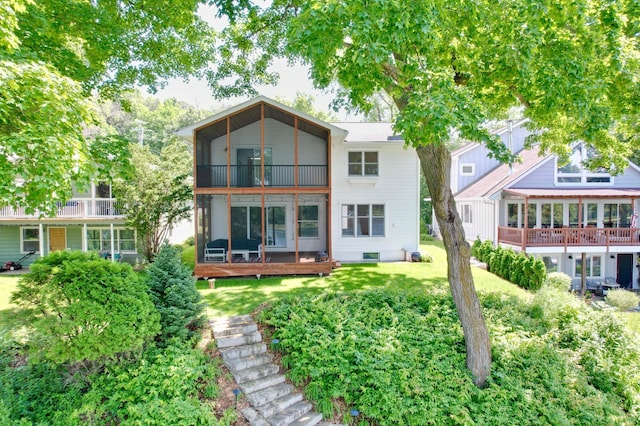 577 Park Ln, Orono, MN 55356 - rear view of property featuring a balcony and a lawn