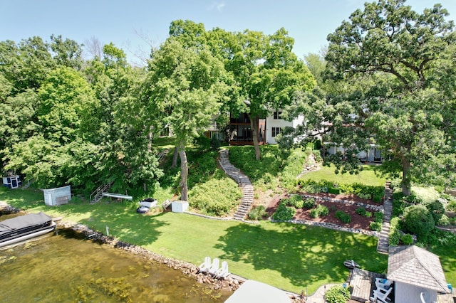 577 Park Ln, Orono, MN 55356 - view of grassy yard with stairs, a water view, and view of scattered trees