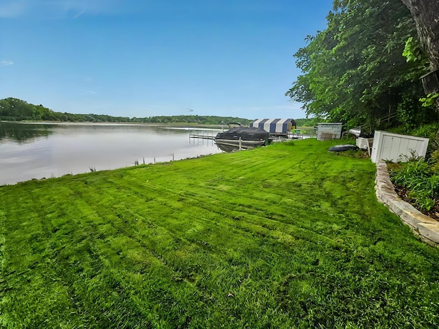 577 Park Ln, Orono, MN 55356 - view of green lawn featuring a water view and a boat dock
