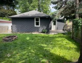 1402 Furness Pkwy, Saint Paul, MN 55119 - back of house with an outdoor fire pit