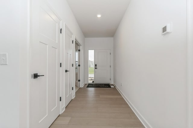 4021 Heath Ln N, Oakdale, MN 55128 - doorway to outside with light wood-style floors and recessed lighting