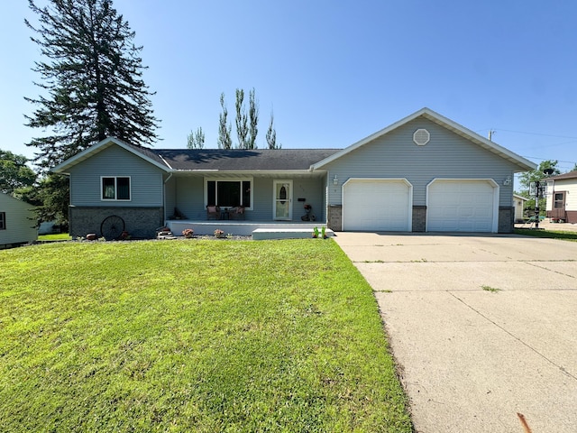 915 Stanton Ave, Fergus Falls, MN 56537 - single story home featuring a garage, covered porch, driveway, a front lawn, and brick siding