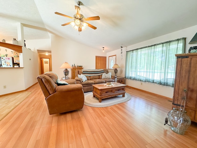 915 Stanton Ave, Fergus Falls, MN 56537 - living area featuring ceiling fan, lofted ceiling, and light wood-style floors