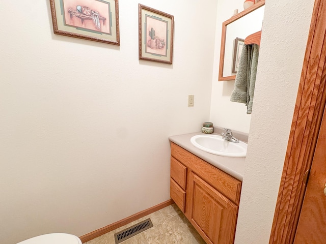 915 Stanton Ave, Fergus Falls, MN 56537 - half bath with vanity and tile patterned floors