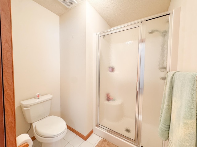 915 Stanton Ave, Fergus Falls, MN 56537 - full bathroom featuring a stall shower, a textured ceiling, and tile patterned floors