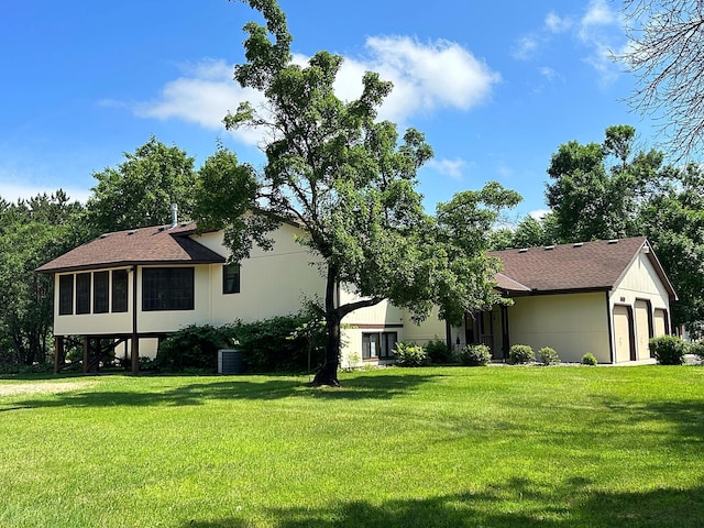 8180 Diane St, Circle Pines, MN 55014 - view of front of property featuring a front yard and an attached garage