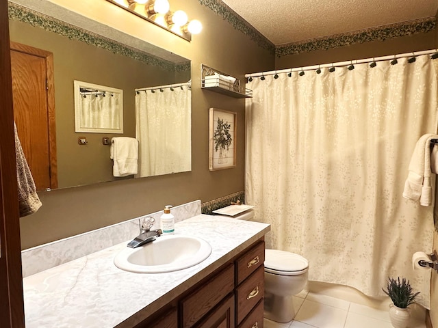 8180 Diane St, Circle Pines, MN 55014 - full bath with vanity, tile patterned floors, and a textured ceiling