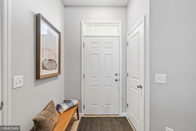1013 2nd St NW, Delano, MN 55328 - doorway featuring baseboards