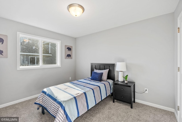 1013 2nd St NW, Delano, MN 55328 - carpeted bedroom featuring baseboards