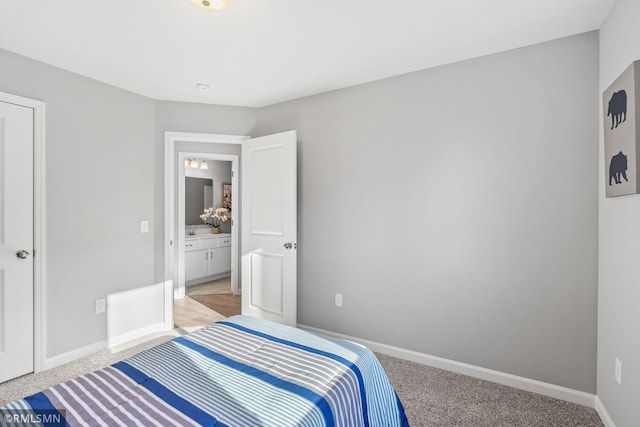 1013 2nd St NW, Delano, MN 55328 - bedroom featuring baseboards and light colored carpet