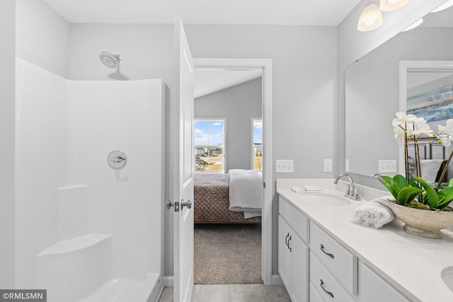 1013 2nd St NW, Delano, MN 55328 - full bathroom with ensuite bath, double vanity, a shower, and tile patterned floors