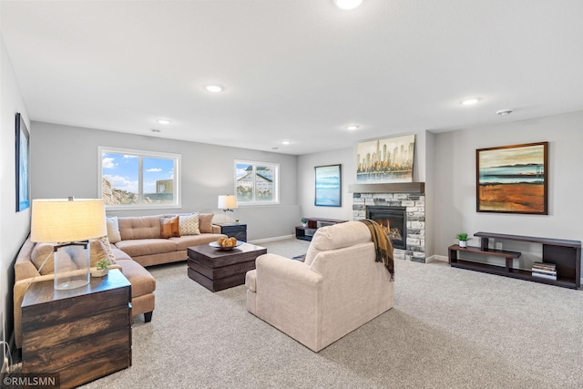 1013 2nd St NW, Delano, MN 55328 - living area with carpet, recessed lighting, plenty of natural light, and a fireplace
