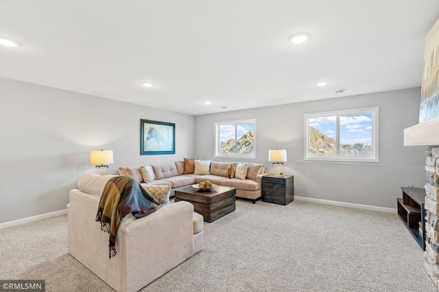 1013 2nd St NW, Delano, MN 55328 - living room featuring carpet floors, a fireplace, and recessed lighting