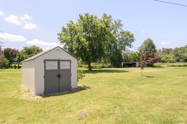W224S9735 Big Bend Dr, Vernon, WI 53103 - view of green lawn with a storage unit