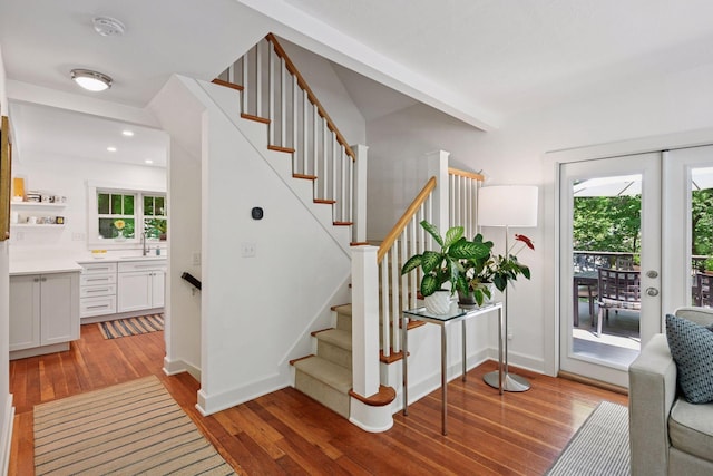 3815 Deephaven Ave, Deephaven, MN 55391 - stairs featuring wood finished floors, plenty of natural light, and recessed lighting