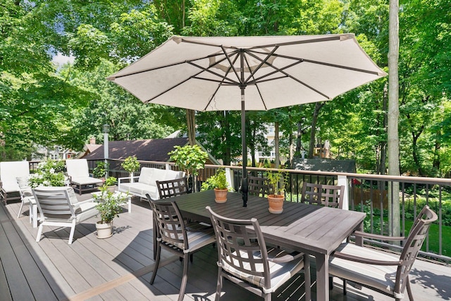 3815 Deephaven Ave, Deephaven, MN 55391 - wooden deck featuring outdoor dining area and view of wooded area