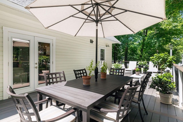 3815 Deephaven Ave, Deephaven, MN 55391 - wooden deck with outdoor dining area and french doors