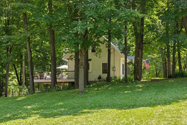 3815 Deephaven Ave, Deephaven, MN 55391 - view of side of property with a wooden deck and a lawn