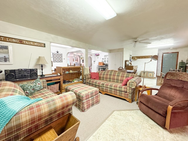 702 Beech Ave, Fergus Falls, MN 56537 - living area with ceiling fan and arched walkways