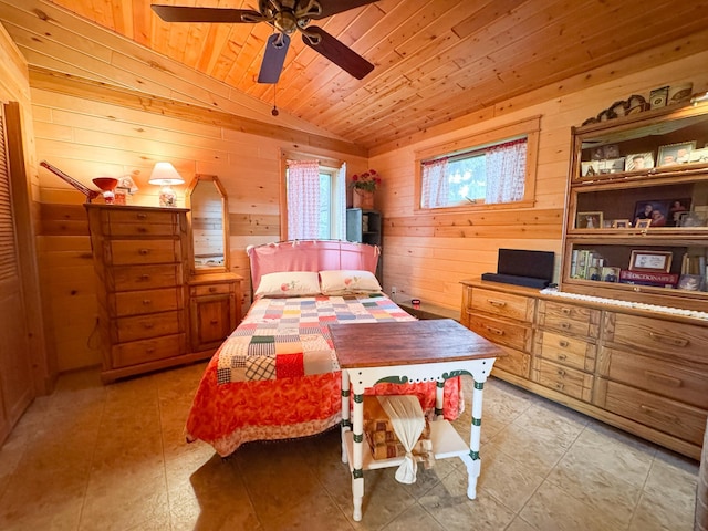 702 Beech Ave, Fergus Falls, MN 56537 - bedroom with lofted ceiling, wood walls, light tile patterned floors, wood ceiling, and a ceiling fan