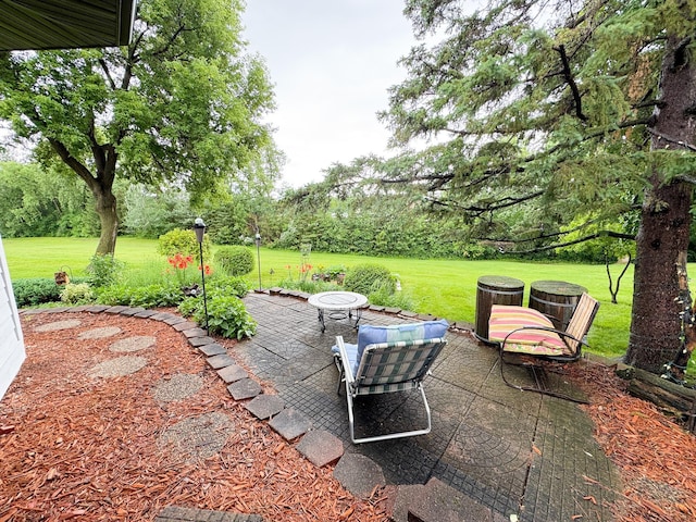 702 Beech Ave, Fergus Falls, MN 56537 - view of patio featuring view of wooded area