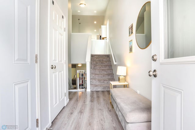 6870 17th St S, Fargo, ND 58104 - entryway featuring wood finished floors and stairs