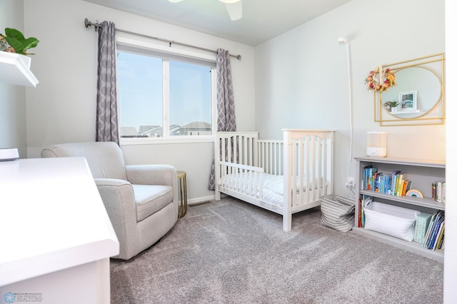 6870 17th St S, Fargo, ND 58104 - carpeted bedroom with a nursery area and a ceiling fan