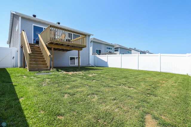 6870 17th St S, Fargo, ND 58104 - rear view of property with stairway, a fenced backyard, and a deck