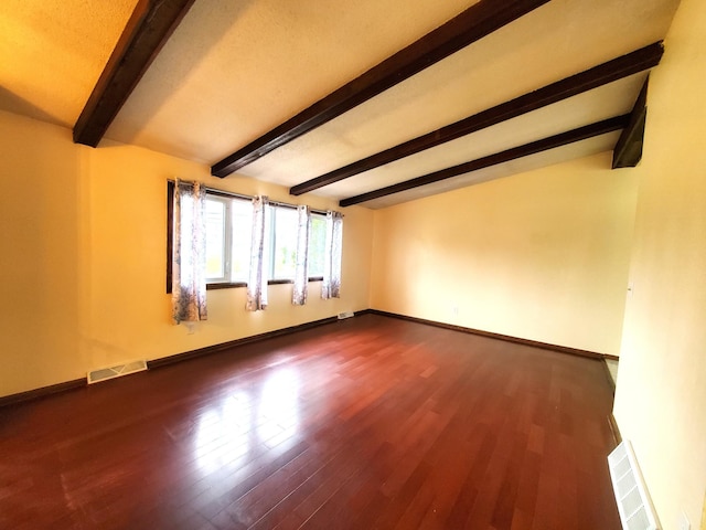 8921 49th Ave N, New Hope, MN 55428 - empty room featuring beam ceiling and dark wood-style flooring