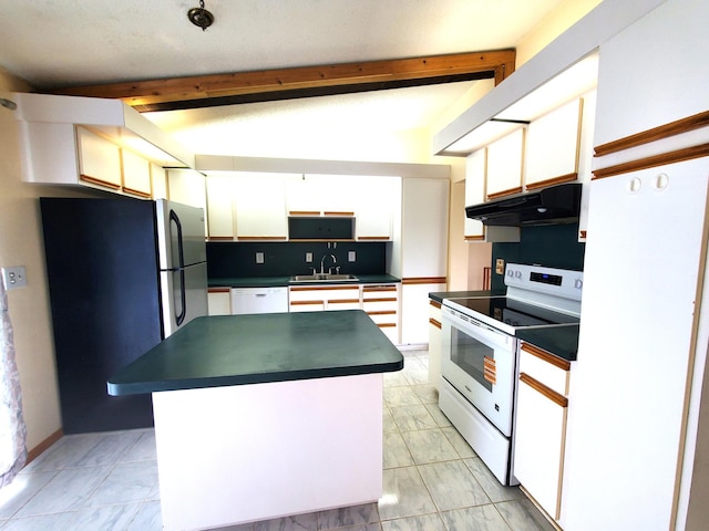 8921 49th Ave N, New Hope, MN 55428 - kitchen with white appliances, under cabinet range hood, dark countertops, beam ceiling, and white cabinetry