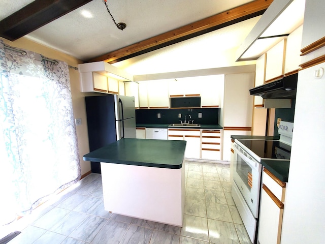 8921 49th Ave N, New Hope, MN 55428 - kitchen featuring white appliances, dark countertops, under cabinet range hood, white cabinets, and a center island