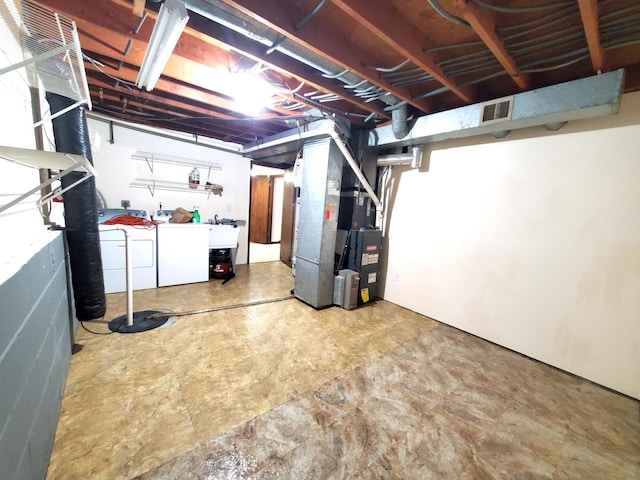 8921 49th Ave N, New Hope, MN 55428 - unfinished below grade area with washer and dryer and heating unit