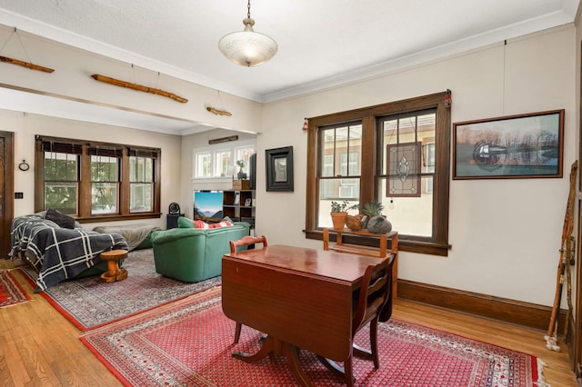 1914 Grand Ave, Saint Paul, MN 55105 - home office featuring wood finished floors, healthy amount of natural light, and crown molding