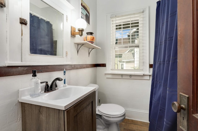 1914 Grand Ave, Saint Paul, MN 55105 - bathroom featuring vanity and wood finished floors