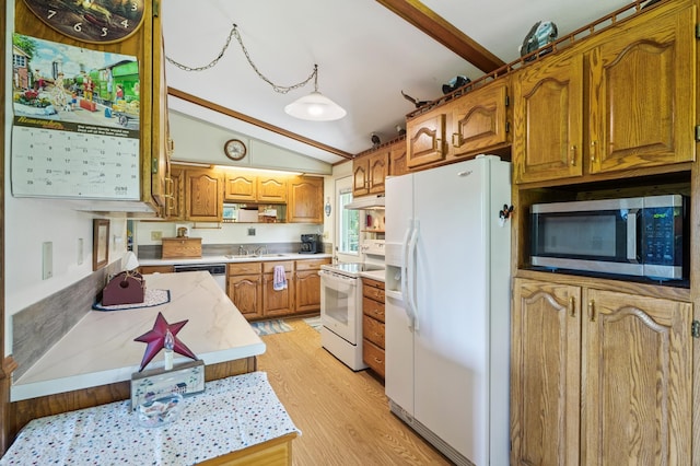 2160 35th Ave, Alden Twp, WI 54026 - kitchen with white appliances, light countertops, under cabinet range hood, light wood-style flooring, and brown cabinets