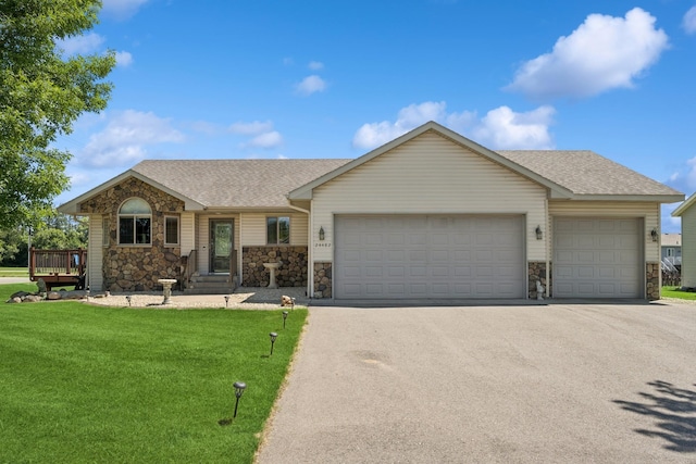 24482 18th Ave, Saint Augusta, MN 56301 - ranch-style house featuring stone siding, a garage, and a shingled roof