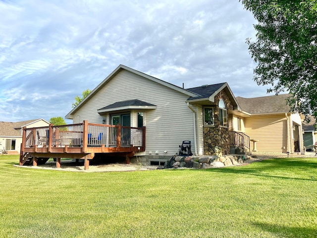24482 18th Ave, Saint Augusta, MN 56301 - rear view of house with a lawn and a wooden deck