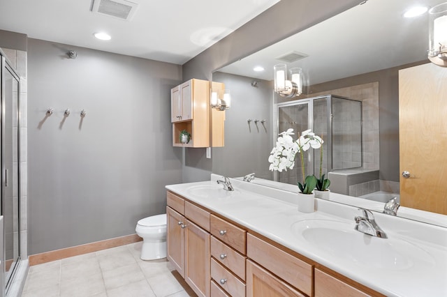 317 Groveland Ave Unit 106, Minneapolis, MN 55403 - bathroom with a shower stall, double vanity, tile patterned floors, recessed lighting, and a tub to relax in