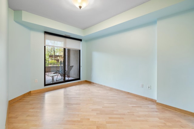 317 Groveland Ave Unit 106, Minneapolis, MN 55403 - unfurnished room featuring light wood-style floors