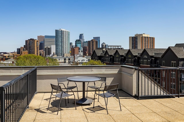 317 Groveland Ave Unit 106, Minneapolis, MN 55403 - view of patio with a skyline view