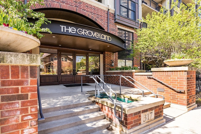 317 Groveland Ave Unit 106, Minneapolis, MN 55403 - entrance to property featuring brick siding and french doors